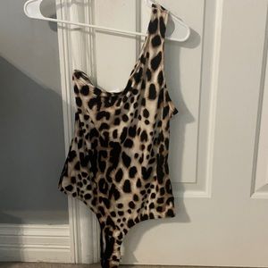 Leopard print one shoulder body suit.